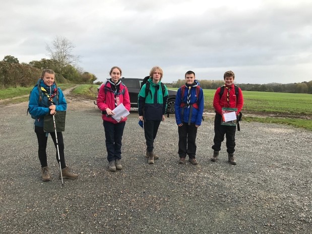 A group of people posing for the cameraDescription automatically generated